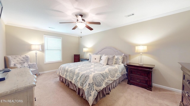 bedroom with baseboards, ornamental molding, visible vents, and light carpet