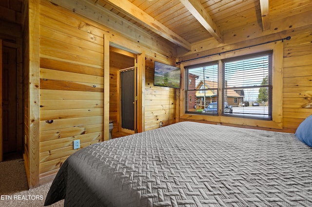 936 Buck Way, Sevierville, TN 37876 - carpeted bedroom featuring wood walls, wood ceiling, and beam ceiling