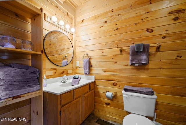 936 Buck Way, Sevierville, TN 37876 - bathroom with toilet, wood walls, and vanity