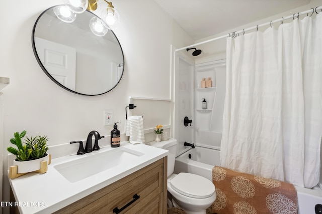 full bath featuring vanity, toilet, and shower / bath combo