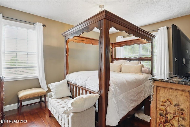 12116 W Kings Gate Rd, Farragut, TN 37934 - bedroom featuring wood finished floors, baseboards, and a textured ceiling