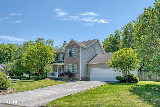 view of front of home featuring a garage, a chimney, concrete driveway, and a front yard