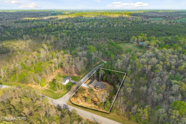 bird's eye view with a forest view
