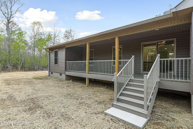 back of house with covered porch and crawl space