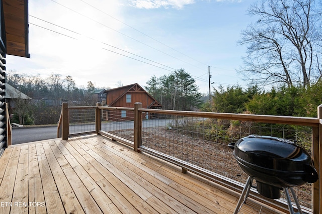deck featuring an outdoor structure