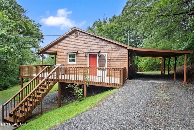 3009 Winding Way, Cosby, TN 37722 - view of front of house featuring driveway, a deck, an attached carport, and stairs