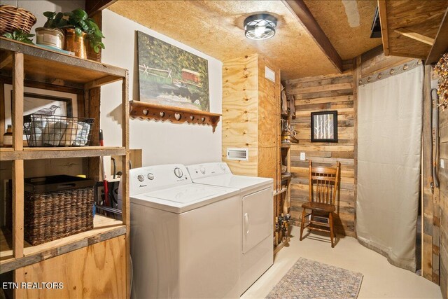 3009 Winding Way, Cosby, TN 37722 - laundry room featuring wood walls and washer and clothes dryer