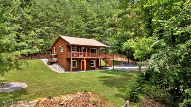 3009 Winding Way, Cosby, TN 37722 - rear view of property featuring stairway, a deck, a wooded view, a lawn, and a patio