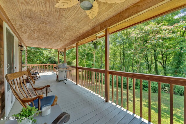 3009 Winding Way, Cosby, TN 37722 - wooden terrace featuring area for grilling, ceiling fan, and a lawn