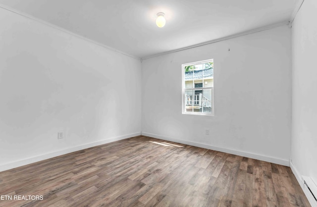 1526 W View St, Athens, TN 37303 - unfurnished room with crown molding, baseboards, baseboard heating, and wood finished floors