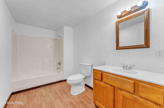 1526 W View St, Athens, TN 37303 - bathroom featuring wood finished floors, vanity, baseboards, toilet, and shower / bathtub combination
