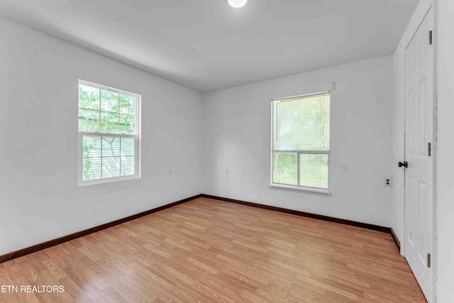 1526 W View St, Athens, TN 37303 - unfurnished bedroom with baseboards, a closet, and light wood-type flooring