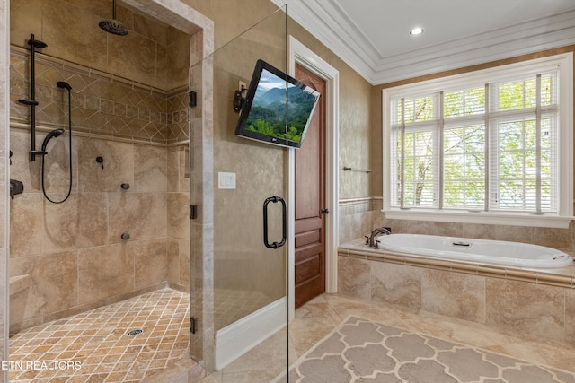 full bath with crown molding, a garden tub, and a stall shower