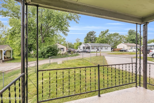 balcony featuring a residential view