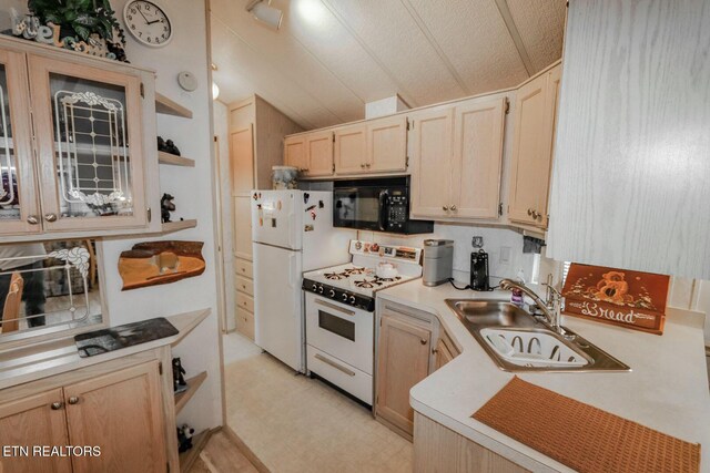 5355 E Pkwy, Cosby, TN 37722 - kitchen featuring light countertops, open shelves, light brown cabinetry, and white appliances