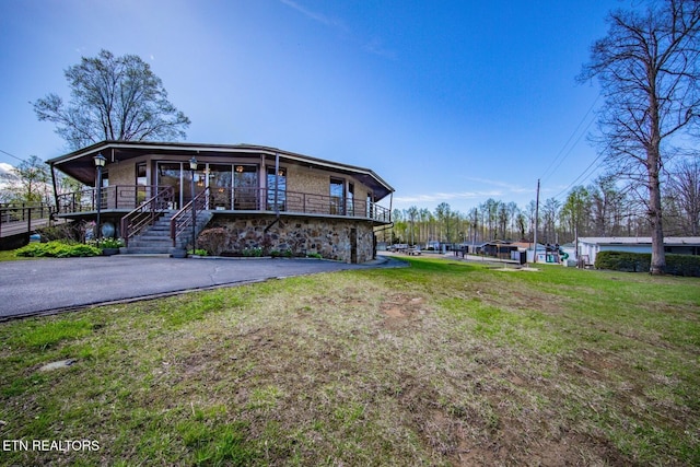 5355 E Pkwy, Cosby, TN 37722 - view of front of property featuring a front yard and stone siding