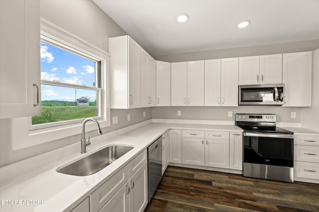 448 Taylor Rd, Byrdstown, TN 38549 - kitchen featuring a sink, appliances with stainless steel finishes, recessed lighting, and white cabinetry