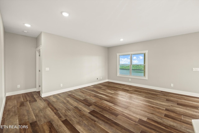 448 Taylor Rd, Byrdstown, TN 38549 - spare room with recessed lighting, baseboards, and dark wood-style flooring