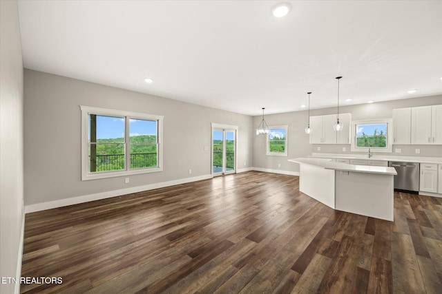 448 Taylor Rd, Byrdstown, TN 38549 - kitchen featuring light countertops, dark wood-style flooring, open floor plan, and dishwasher