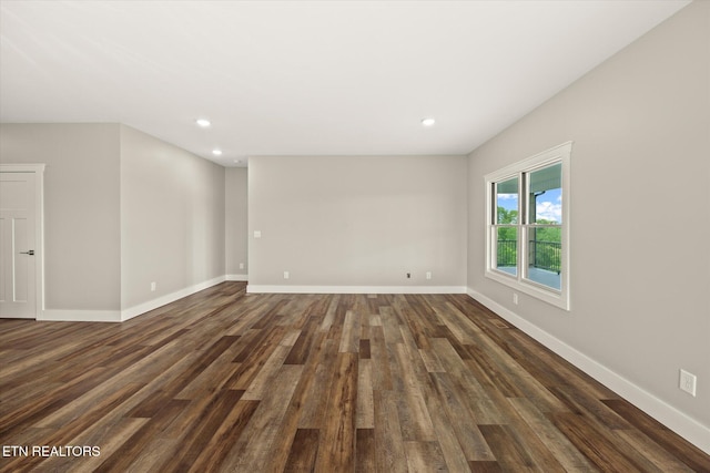 448 Taylor Rd, Byrdstown, TN 38549 - empty room featuring recessed lighting, baseboards, and dark wood-type flooring