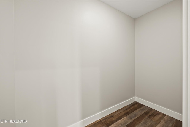 448 Taylor Rd, Byrdstown, TN 38549 - spare room with baseboards and dark wood-type flooring