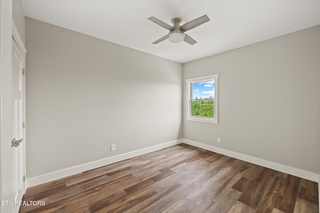 448 Taylor Rd, Byrdstown, TN 38549 - empty room with baseboards, a ceiling fan, and wood finished floors