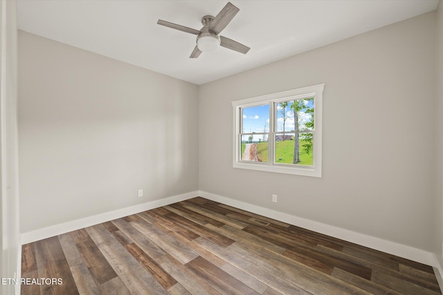 448 Taylor Rd, Byrdstown, TN 38549 - unfurnished room with baseboards, visible vents, dark wood-style floors, and ceiling fan