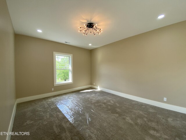 carpeted spare room with baseboards, recessed lighting, and visible vents