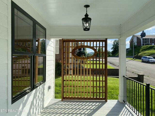 exterior space featuring covered porch