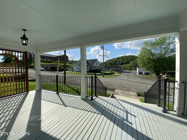 wooden terrace with covered porch