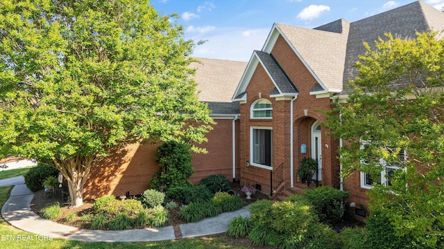 1614 Pinnacle Point Dr, Alcoa, TN 37701 - view of property exterior with roof with shingles and brick siding