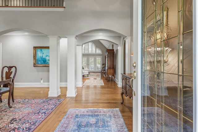1614 Pinnacle Point Dr, Alcoa, TN 37701 - entryway with arched walkways, decorative columns, french doors, and wood finished floors