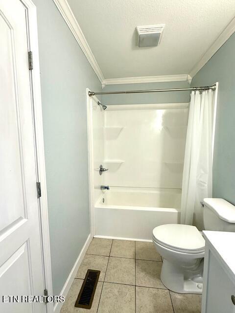 217 Loomis St, Tellico Plains, TN 37385 - bathroom with visible vents, ornamental molding, and tile patterned flooring