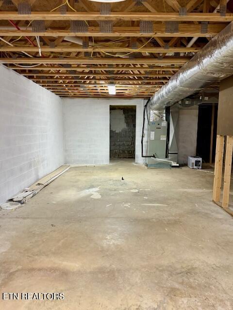 217 Loomis St, Tellico Plains, TN 37385 - unfinished basement featuring heating unit