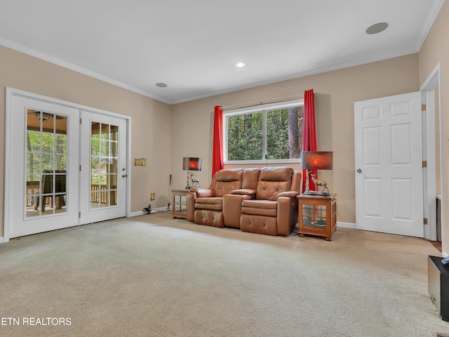 carpeted living room with baseboards, ornamental molding, and recessed lighting