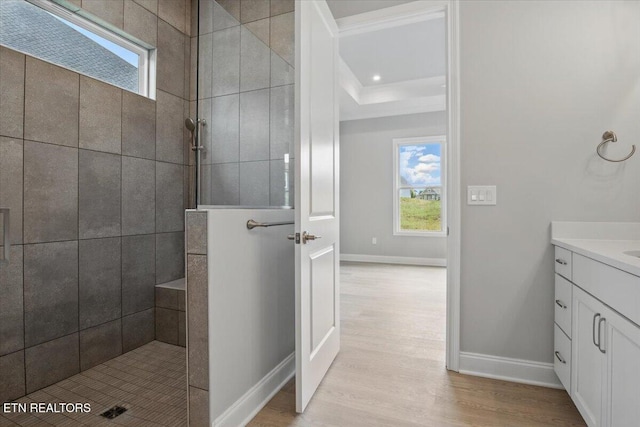 342 Bittersweet Ln, Lenoir City, TN 37771 - bathroom with healthy amount of natural light, walk in shower, vanity, and wood finished floors