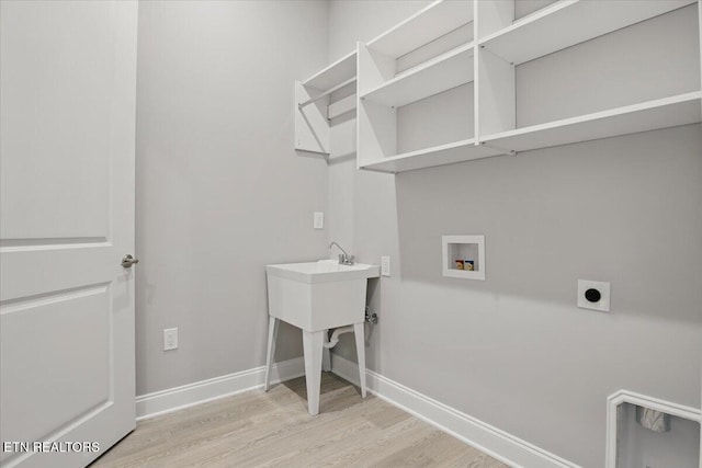 342 Bittersweet Ln, Lenoir City, TN 37771 - laundry room featuring electric dryer hookup, light wood-style flooring, baseboards, and hookup for a washing machine