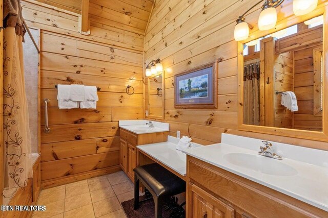4430 Shangrila Way, Sevierville, TN 37876 - full bath featuring tile patterned floors, wood walls, a shower with shower curtain, and vanity