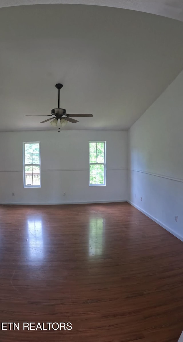 2094 NW Cecil Johnson Rd, Knoxville, TN 37921 - spare room featuring dark wood finished floors, ceiling fan, and baseboards