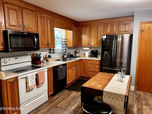 kitchen with brown cabinets, white range with electric stovetop, a sink, dishwasher, and refrigerator with ice dispenser