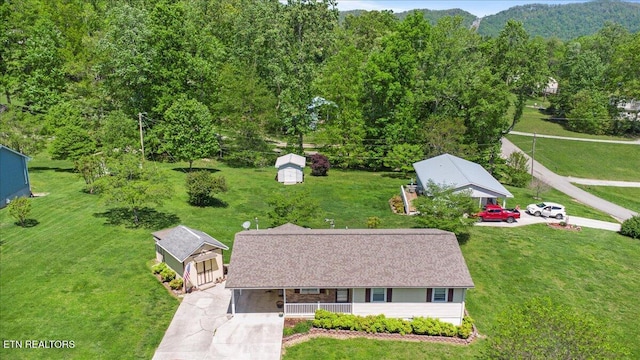 bird's eye view featuring a forest view