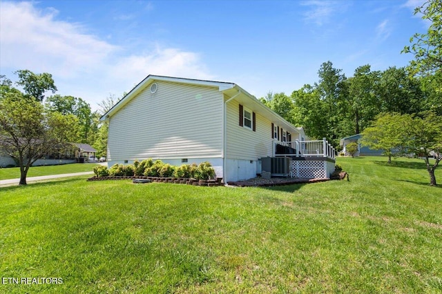 view of home's exterior with a yard, crawl space, and cooling unit