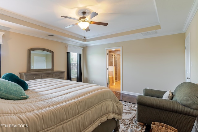 1827 Autumn Bluff Rd, Knoxville, TN 37932 - bedroom featuring a raised ceiling, wood finished floors, crown molding, baseboards, and ensuite bathroom
