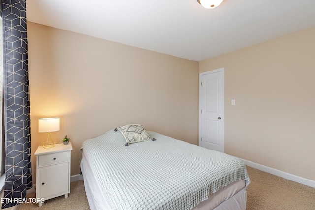 1827 Autumn Bluff Rd, Knoxville, TN 37932 - bedroom with light carpet and baseboards