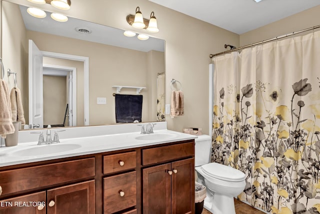 1827 Autumn Bluff Rd, Knoxville, TN 37932 - bathroom featuring double vanity, toilet, tile patterned floors, and curtained shower