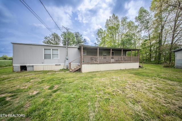 back of property with a yard