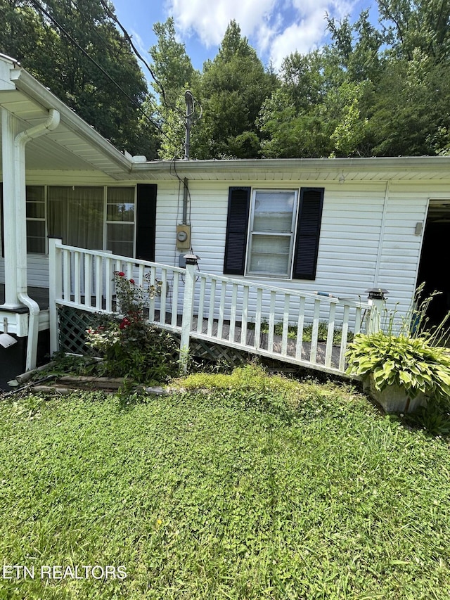 3510 Briceville Hwy, Briceville, TN 37710 - exterior space featuring a lawn and covered porch