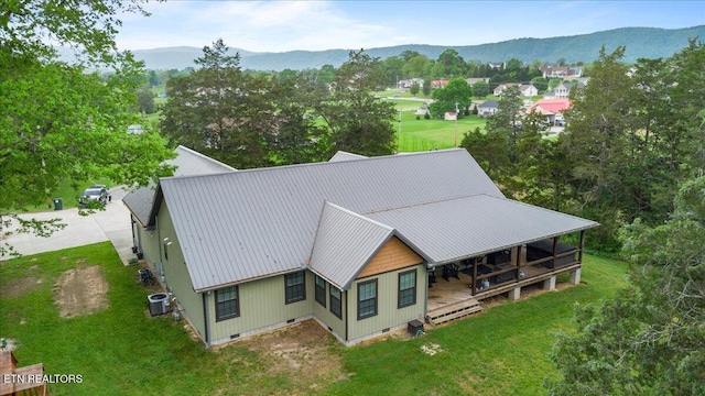 drone / aerial view featuring a mountain view
