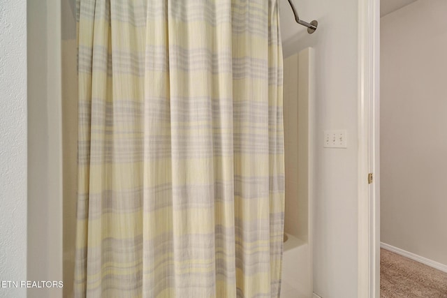 bathroom featuring baseboards