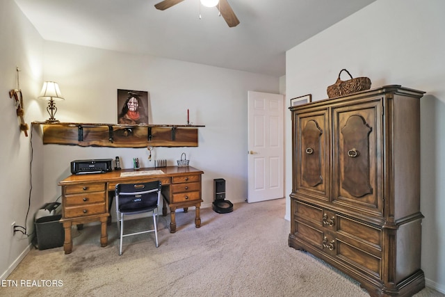 office with baseboards, a ceiling fan, and carpet flooring